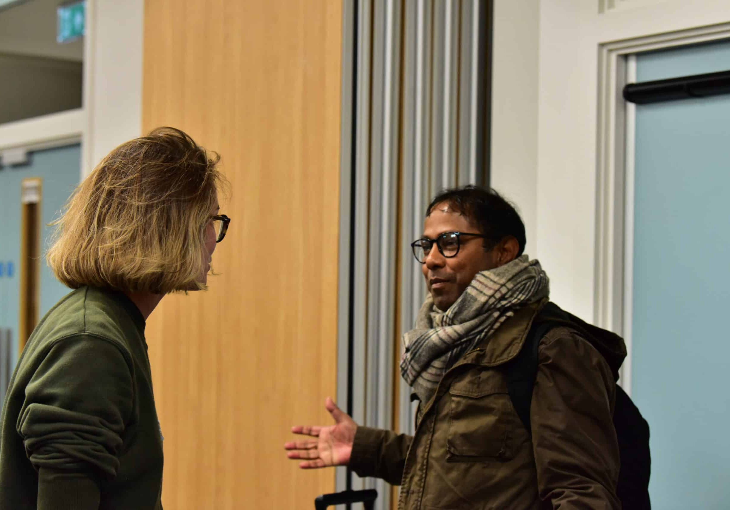 Morshed and Dora in conversation